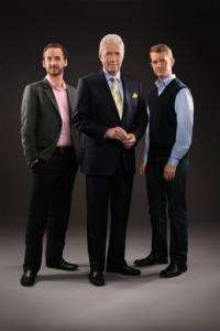 L-R: Contestant Brad Rutter, Jeopardy host Alex Trebek and contestant Ken Jennings