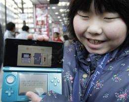 Nintendo 3-D handheld goes on sale in Japan (AP)