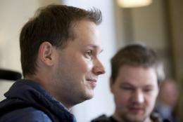 Pirate Bay founders Peter Sunde, left, and Frederik Neij attend court in Stockholm