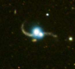 Quasar Pair Captured in Galaxy Collision