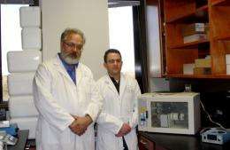 Researcher Nicholas Genovese (R) with biologist Vladimir Mironov in their Charleston research laboratory