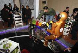 Robot waiters in China never lose patience (AP)