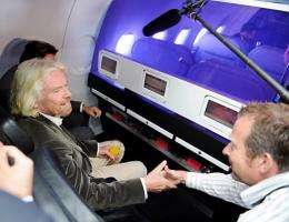 Sir Richard Branson flies on Virgin America's first international flight to Toronto