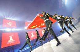 Soldiers from the People's Liberation Army participate in the opening ceremony for the Asian Games