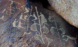 The ancient Aboriginal rock carving known as 'Climbing Man' (C)