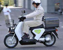 The "EV-neo" scooter can travel 30 kms (19 miles) on a single charge at up to 30 kms per hour