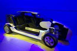 The model of an electric car is displayed at the facilities of Better Place
