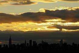The sun sets over the Manhattan skyline