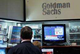 Traders sit in the Goldman Sachs' booth on the floor of the New York Stock Exchange