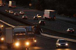 Trucks and cars travel the 10 freeway near Banning, California