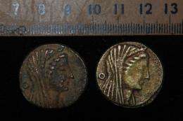 Two coins dating back to the era of Ptolemy III