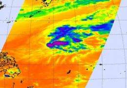 Winds blow off Omais' thunderstorm tops