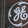 General Electric reports loss